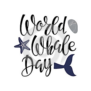 World Whale Day handwritten calligraphy lettering. Words with whale tail, pebbles, fishstar. Vector isolated Background photo