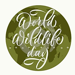 World wildlife day- calligraphic inscription with planet on background. Pows on path. Vector.