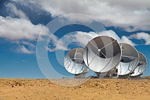 The worldwide biggest telescope Array is in Chile. Alma consists of over 60 radio antennas photo