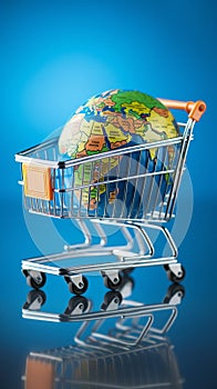 Worldwide shopping concept Trolley placed on a blue globe surface represents global commerce.