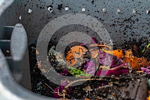 Worm farm composting with breathing holes and a plastic bin to make vermiculite