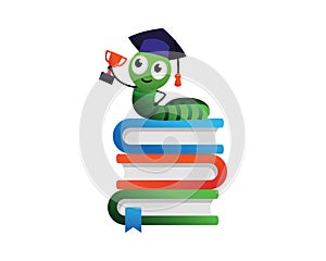 Worm Holding Trophy on the Stacks of Books as Symbolization of Bookworm or People Who Like to Read photo