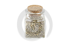 Wormwood herb or in latin Absinthii herba herb in a glass jar isolated on white background. medicinal healing herbs.