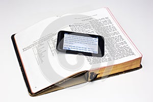 Worn Bible and Smartphone - Genesis photo