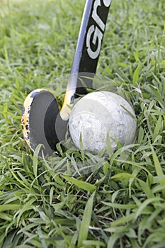 Worn Field Hockey Stick and Ball