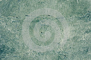 Worn green paint wall background texture.