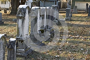Worn headstones in old graveyard