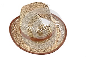Worn And Holey Isolated Straw Hat photo