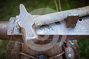 Worn iron anvil and hammer