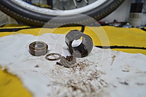 Worn-out bicycle bushing with spokes