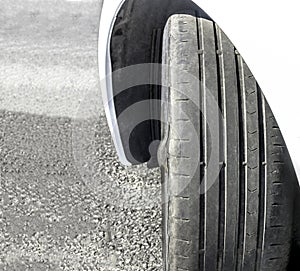 Worn Out and Damaged Car Tire