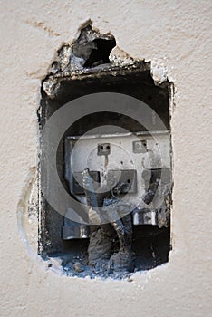 Worn out electrical equipment of a municipal building