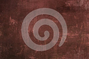 Worn red metal plate