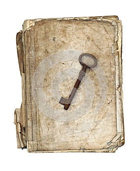 Worn and tattered book with old rusty key