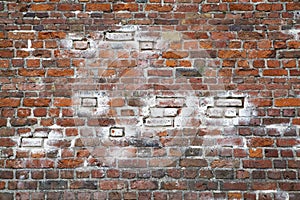 Worn Weathered Dirty Red Brick Wall Background with White Pieces