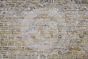 Worn Weathered Dirty Yellow Brick Wall Background