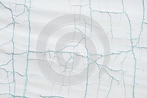 Worn white tarp texture as background photo