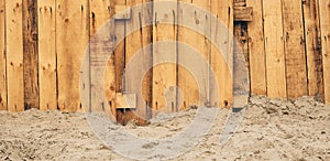 Worn wooden beach fence as background and copy space