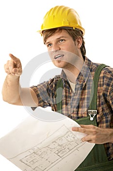 Worried builder with floor plan