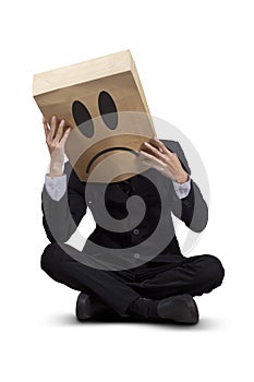 Worried businessman with cardboard head