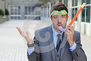 Worried businessman with scuba diving equipment