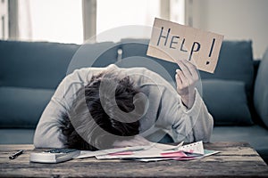 Upset young woman asking for help in paying bills Mortgage home or business finance problems photo