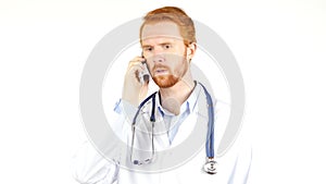 worried doctor calling someone , speaking on the phone