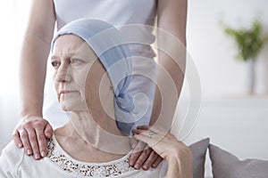 Worried elderly woman with cancer