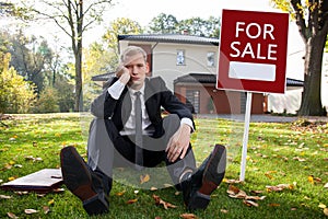 Worried estate agent photo