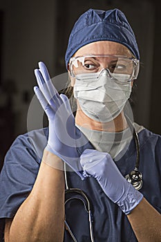 Worried Female Doctor or Nurse Putting on Protective Facial We