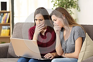 Worried friends watching media content on line