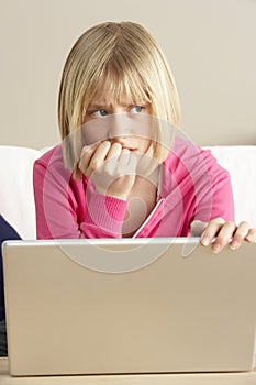 Worried Looking Girl Using Laptop