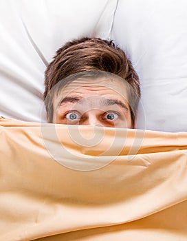 Worried Man in the Bed