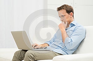 Worried Man With Laptop