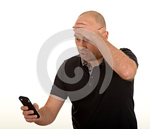 Worried man looking at mobile