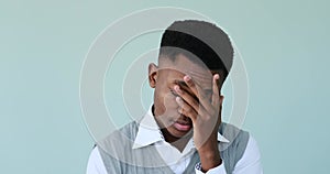 Worried man shaking his head