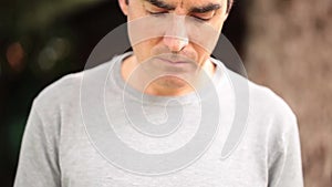 Worried Man Using Smartphone