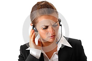 Worried modern business woman with headset