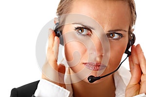 Worried modern business woman with headset