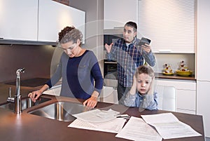 Worried mother suffering while father scream