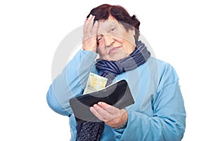 Worried pensioner hold wallet with last penny