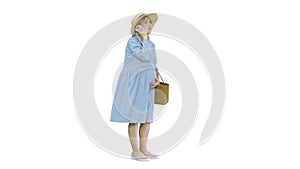 Worried Pregnant Woman Talking on the Phone having contractions on white background.