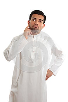 Worried troubled ethnic man wearing a kurta photo