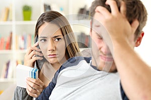 Worried wife calling doctor requesting information photo