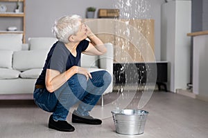 Worried Woman Calling Plumber