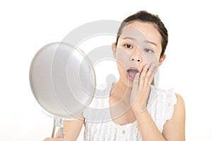 Worried woman having skin problems