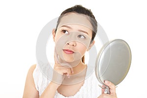 Worried woman having skin problems