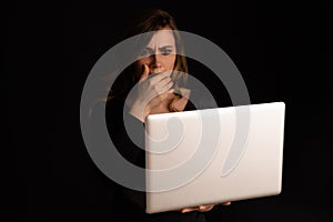 Worried woman with laptop isolated. Computer problem concept.