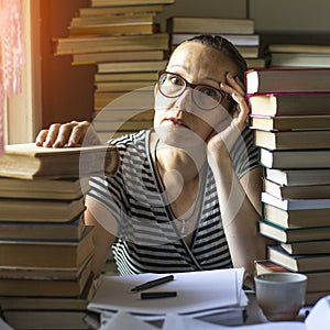 Worried woman preparing for exams.