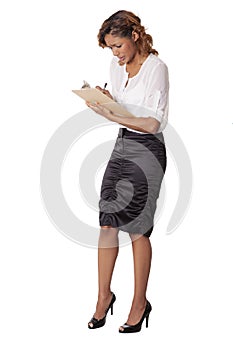 Worried woman takes notes on a clipboard.